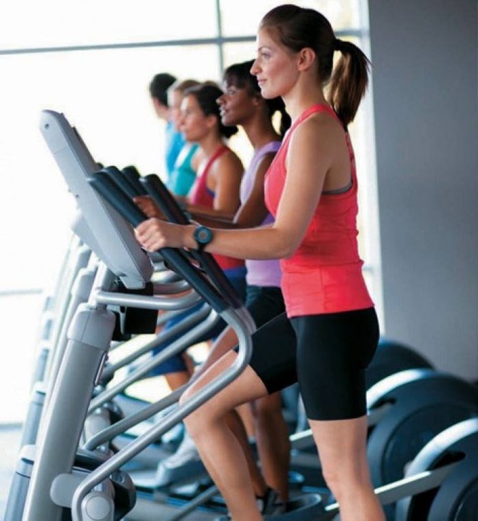Exercise using Cross Trainer Benefits Health Fitness India